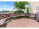 A wooden back deck features built-in bench seating, offering a cozy outdoor space at 1821 Midnight Pass, Brownsburg, IN 46112