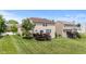 A well-maintained backyard features a deck, creating an inviting outdoor living area at 1821 Midnight Pass, Brownsburg, IN 46112