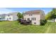 A spacious backyard features a deck, perfect for outdoor entertaining and relaxing in the fresh air at 1821 Midnight Pass, Brownsburg, IN 46112