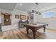 Basement area featuring a pool table with decorative lighting, and a cue rack at 1821 Midnight Pass, Brownsburg, IN 46112