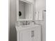 Charming half-bath with a white vanity, silver hardware, and a framed mirror at 1821 Midnight Pass, Brownsburg, IN 46112