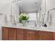Primary bathroom featuring a dual sink vanity with ample counter space and wood cabinetry at 1821 Midnight Pass, Brownsburg, IN 46112
