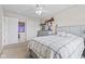 This bedroom features a ceiling fan, closet, and large window at 1821 Midnight Pass, Brownsburg, IN 46112