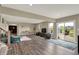 Spacious finished basement with modern flooring and walkout to the backyard patio at 18398 Cross Lakes Ct, Westfield, IN 46074