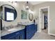 Luxurious bathroom with double vanity, granite countertops, and plenty of storage space at 18398 Cross Lakes Ct, Westfield, IN 46074