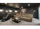 Luxury home theater with plush seating, a large screen, and premium entertainment features at 18398 Cross Lakes Ct, Westfield, IN 46074