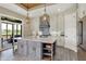 Modern kitchen featuring a large island with seating and stainless steel appliances at 18398 Cross Lakes Ct, Westfield, IN 46074