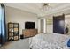 Relaxing bedroom featuring a decorative bed frame, neutral tones, and ample closet space at 18398 Cross Lakes Ct, Westfield, IN 46074