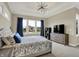 Comfortable bedroom with large windows offering scenic views and ample natural light at 18398 Cross Lakes Ct, Westfield, IN 46074
