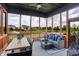Relaxing screened in deck with a view of the pond at 18398 Cross Lakes Ct, Westfield, IN 46074