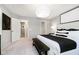 Bedroom showcases neutral walls, plush carpet, and a cozy bed, creating a comfortable and inviting space at 18736 Moray St, Westfield, IN 46074