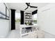Stylish home office featuring black accents, ample natural light, and minimalist decor for a productive workspace at 18736 Moray St, Westfield, IN 46074