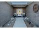 Inviting front porch with chairs and decor, set within a brick-lined entry at 201 St Andrews Ave, Edinburgh, IN 46124