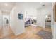 Spacious hallway with hardwood floors, open to the living room and kitchen at 201 St Andrews Ave, Edinburgh, IN 46124