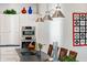 Kitchen boasts stainless appliances, ample cabinet space, and an island with seating for four at 201 St Andrews Ave, Edinburgh, IN 46124