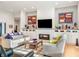 Bright and spacious living room with a modern fireplace and stylish decor at 201 St Andrews Ave, Edinburgh, IN 46124