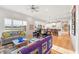 Inviting living area with open layout, fireplace, and view of kitchen at 201 St Andrews Ave, Edinburgh, IN 46124