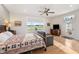 Inviting main bedroom showcasing a sitting area with exterior access and bright natural light at 201 St Andrews Ave, Edinburgh, IN 46124