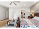 Well-lit main bedroom featuring an adjoining bathroom and closet at 201 St Andrews Ave, Edinburgh, IN 46124
