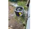 Exterior home air conditioning unit with visible EnergyGuide sticker and black protective grill at 2015 S Hackley St, Muncie, IN 47302