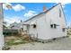 This home features a fenced-in backyard and a detached garage for extra storage or parking at 2015 S Hackley St, Muncie, IN 47302