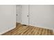 This bedroom features vinyl flooring, ample space, and an open closet at 2015 S Hackley St, Muncie, IN 47302