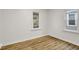 Bedroom features vinyl floors and natural light from the windows at 2015 S Hackley St, Muncie, IN 47302