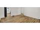 The living room boasts new flooring and leads into the updated kitchen at 2015 S Hackley St, Muncie, IN 47302