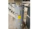 AO Smith Signature 100 water heater with EnergyGuide sticker and other components at 2015 S Hackley St, Muncie, IN 47302