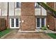 Exterior shot of backyard including doors and brick exterior at 2263 Rome Dr, Indianapolis, IN 46228