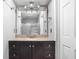 Bathroom features a sink with granite countertops and a track lighting fixture at 2263 Rome Dr, Indianapolis, IN 46228
