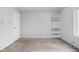 Bedroom featuring dirty carpet and a small built-in shelf at 2263 Rome Dr, Indianapolis, IN 46228