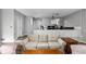 Cozy living room with an eating area and white brick accent wall at 2263 Rome Dr, Indianapolis, IN 46228