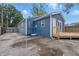 This home features stylish blue siding and a cozy wooden deck, enhancing its curb appeal and offering outdoor space at 2315 Spann Ave, Indianapolis, IN 46203