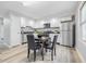Modern kitchen with stainless steel appliances and dining area at 2315 Spann Ave, Indianapolis, IN 46203