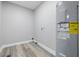 Utility room with water heater and connections for laundry at 2315 Spann Ave, Indianapolis, IN 46203