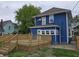 Home featuring a wood deck and balcony area at 24 N Randolph St, Indianapolis, IN 46201