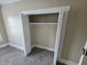 This is a bedroom closet with standard hardware and a rack for hanging clothes at 24 N Randolph St, Indianapolis, IN 46201