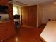 Spacious kitchen with wood cabinetry, hardwood floors, and plenty of storage at 2625 S 200 E, Lebanon, IN 46052
