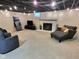 Finished basement providing entertainment space with comfortable seating and a cozy fireplace at 2741 Fairlawn Dr, Columbus, IN 47203