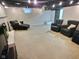 Finished basement with recessed lighting, and comfortable seating at 2741 Fairlawn Dr, Columbus, IN 47203