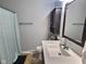 Cozy bathroom featuring a vanity with a mirror and a shower with a curtain at 2741 Fairlawn Dr, Columbus, IN 47203