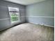 Bright bedroom featuring neutral color palette and plenty of natural light at 2741 Fairlawn Dr, Columbus, IN 47203