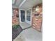 The front door to 2741, surrounded by decorative brick, leads into the home at 2741 Fairlawn Dr, Columbus, IN 47203