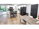 Modern kitchen with white cabinets, stainless steel appliances, and a black refrigerator at 2741 Fairlawn Dr, Columbus, IN 47203