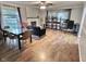 Bright living room with fireplace, modern furnishings, and wood flooring at 2741 Fairlawn Dr, Columbus, IN 47203