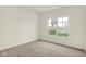 Light and airy bedroom with a large window and neutral carpet at 2750 Glade Ave, Plainfield, IN 46168