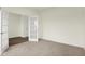 Spacious carpeted bedroom with white french doors and trim at 2750 Glade Ave, Plainfield, IN 46168