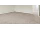 Neutral carpeted bedroom with an open doorway offering an inviting space at 2750 Glade Ave, Plainfield, IN 46168