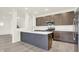 Modern kitchen with stainless steel appliances, island and white countertops at 2750 Glade Ave, Plainfield, IN 46168